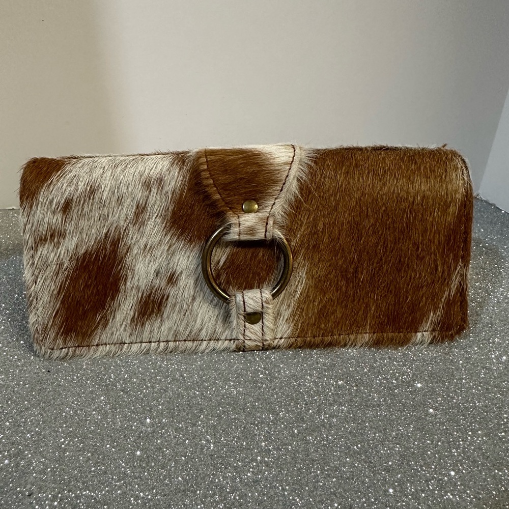 THIS IS A BEAUTIFUL COWHIDE WALLET